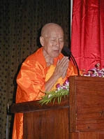 Maha Ghosananda walking during a peace march, demonstrating that peace is a practice walked step by step